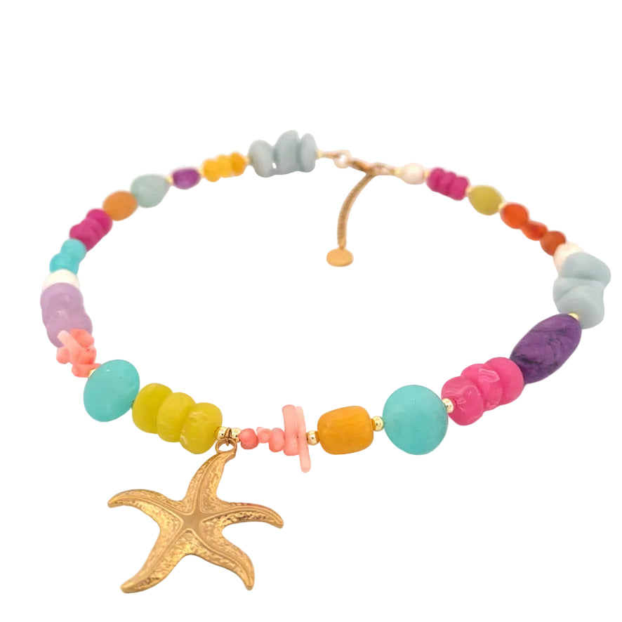 Colorful beaded necklace with a starfish pendant on a white background
